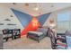 Fun bedroom with red, blue, and white walls at 22633 E Domingo Rd, Queen Creek, AZ 85142