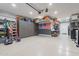 Garage with overhead storage and workbench at 22633 E Domingo Rd, Queen Creek, AZ 85142