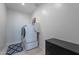 Laundry room with washer, dryer, and storage cabinet at 22633 E Domingo Rd, Queen Creek, AZ 85142