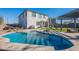 Relaxing kidney-shaped pool in backyard oasis at 22633 E Domingo Rd, Queen Creek, AZ 85142