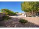 Relaxing backyard with a fire pit and plenty of room for outdoor activities at 23204 N Paseo Laredo Ln, Peoria, AZ 85383