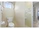 Small bathroom with toilet and single sink vanity at 23204 N Paseo Laredo Ln, Peoria, AZ 85383