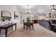 Dining area with seating for six and access to the living room at 23204 N Paseo Laredo Ln, Peoria, AZ 85383