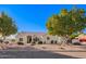 Single-story home with landscaped yard and two-car garage at 23204 N Paseo Laredo Ln, Peoria, AZ 85383