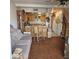 Living room with rocking chair and view of kitchen at 2545 W Rose Ln # A-2, Phoenix, AZ 85017