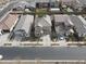 Aerial view of two-story house and surrounding neighborhood at 26049 S 230Th St, Queen Creek, AZ 85142