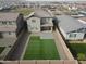 Two-story house, backyard, artificial turf at 26049 S 230Th St, Queen Creek, AZ 85142