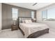 Spacious bedroom with plush bedding and large windows at 26049 S 230Th St, Queen Creek, AZ 85142