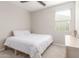 Bright bedroom with a queen bed, window blinds, and carpeted floor at 26049 S 230Th St, Queen Creek, AZ 85142