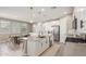 Open kitchen with island, stainless steel appliances, and ample counter space at 26049 S 230Th St, Queen Creek, AZ 85142