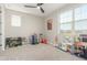 Playroom with toys and storage; bright and cheerful at 26049 S 230Th St, Queen Creek, AZ 85142