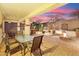Relaxing backyard patio with fire pit and dining area at 31538 N Larkspur Dr, San Tan Valley, AZ 85143