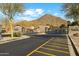 Gated entrance to Solera community, featuring stone pillars and desert landscape at 31538 N Larkspur Dr, San Tan Valley, AZ 85143