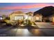 Single-story home with desert landscaping, two-car garage, and mountain views at 31538 N Larkspur Dr, San Tan Valley, AZ 85143