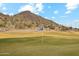 Scenic golf course with desert landscape and mountain backdrop at 31538 N Larkspur Dr, San Tan Valley, AZ 85143