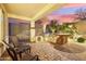 Outdoor kitchen and patio area with sunset view at 31538 N Larkspur Dr, San Tan Valley, AZ 85143