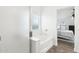 Clean bathroom with a bathtub and sliding glass shower door at 3376 S 256Th Dr, Buckeye, AZ 85326