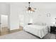 Spacious bedroom with en-suite bathroom and ceiling fan at 3376 S 256Th Dr, Buckeye, AZ 85326