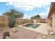 Backyard oasis with private pool and landscaping at 3376 S 256Th Dr, Buckeye, AZ 85326