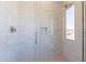 Modern tile shower with glass door and shower niche at 35065 N 83Rd Pl # 4, Scottsdale, AZ 85266