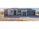 Contemporary home showcasing stone accents, gray color palette, desert landscaping, and two car garage at 35065 N 83Rd Pl # 4, Scottsdale, AZ 85266