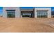 Contemporary home exterior featuring a modern design, large windows, and desert landscaping at 35065 N 83Rd Pl # 4, Scottsdale, AZ 85266