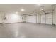 Spacious three car garage with epoxy flooring and automatic garage door openers at 35065 N 83Rd Pl # 4, Scottsdale, AZ 85266