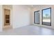 Bright living room with tile flooring, neutral walls and large windows with outdoor views at 35065 N 83Rd Pl # 4, Scottsdale, AZ 85266
