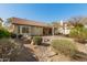 A desert landscaped backyard featuring a covered patio at 4632 E La Mirada Way, Phoenix, AZ 85044