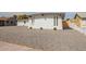 A charming brick home with desert landscaping and a contemporary design at 5528 W Sunnyslope Ln, Glendale, AZ 85302