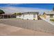 A charming brick home with desert landscaping and a contemporary design at 5528 W Sunnyslope Ln, Glendale, AZ 85302