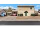 Two-story home with a covered parking area and small, well-maintained front yard bushes at 8328 W Fairmount Ave, Phoenix, AZ 85037