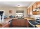 Kitchen showcasing wooden cabinetry, countertops, and a stainless steel dishwasher at 8328 W Fairmount Ave, Phoenix, AZ 85037