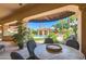 Outdoor patio with seating area overlooking the pool and backyard at 8815 N 65Th St, Paradise Valley, AZ 85253