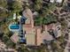 Bird's-eye view of a sprawling estate with pool and multiple buildings at 9290 E Thompson Peak Pkwy # 422, Scottsdale, AZ 85255