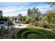 Landscaped backyard oasis with pool, patio, and charming casita at 9290 E Thompson Peak Pkwy # 422, Scottsdale, AZ 85255