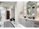 Modern bathroom featuring a marble vanity and a glass-enclosed shower at 9290 E Thompson Peak Pkwy # 422, Scottsdale, AZ 85255