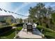 Outdoor dining area with a large table and string lights at 9290 E Thompson Peak Pkwy # 422, Scottsdale, AZ 85255