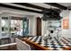 Formal dining room with French doors opening to a private patio at 9290 E Thompson Peak Pkwy # 422, Scottsdale, AZ 85255