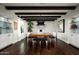 Elegant dining room with a chessboard table and dark hardwood floors at 9290 E Thompson Peak Pkwy # 422, Scottsdale, AZ 85255