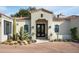 Inviting entrance to a stunning Spanish-style home at 9290 E Thompson Peak Pkwy # 422, Scottsdale, AZ 85255