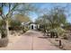 Long driveway leading to a beautiful Spanish-style home at 9290 E Thompson Peak Pkwy # 422, Scottsdale, AZ 85255