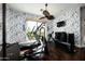 Well-equipped home gym featuring cardio and strength training equipment at 9290 E Thompson Peak Pkwy # 422, Scottsdale, AZ 85255