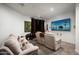Home theater with comfortable seating and large screen TV at 9290 E Thompson Peak Pkwy # 422, Scottsdale, AZ 85255