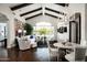 Spacious living room features hardwood floors, high ceilings, and a large window at 9290 E Thompson Peak Pkwy # 422, Scottsdale, AZ 85255