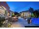 Outdoor patio with fire pit and seating area adjacent to pool at 9290 E Thompson Peak Pkwy # 422, Scottsdale, AZ 85255