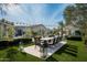 Outdoor dining patio with seating for eight, surrounded by lush landscaping at 9290 E Thompson Peak Pkwy # 422, Scottsdale, AZ 85255