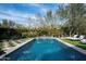Resort-style pool with water features and surrounding landscaping at 9290 E Thompson Peak Pkwy # 422, Scottsdale, AZ 85255
