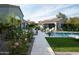 Luxury pool and spa area with spacious patio and outdoor seating at 9290 E Thompson Peak Pkwy # 422, Scottsdale, AZ 85255