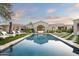 Luxury backyard oasis with a large inviting pool and spacious patio at 9290 E Thompson Peak Pkwy # 422, Scottsdale, AZ 85255
